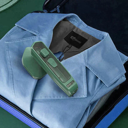 Mini Garment Steamer green steamer steaming blue shirt in Pakistan