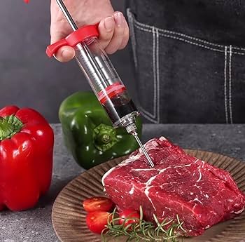 Meat injection syringe injecting steak in Pakistan