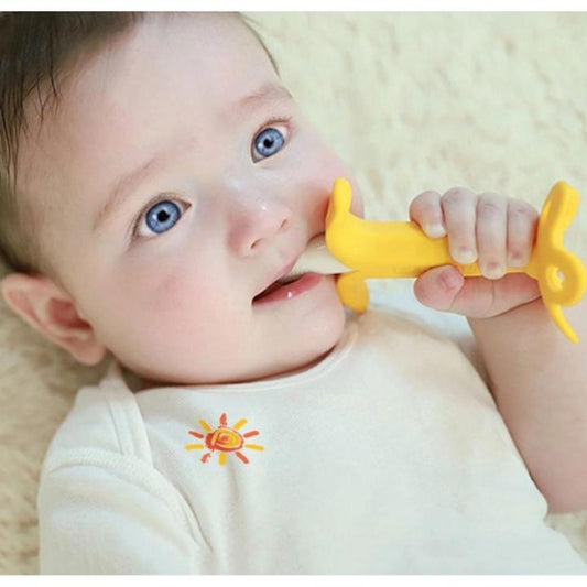 Baby Teether banana teether being used by baby in Pakistan