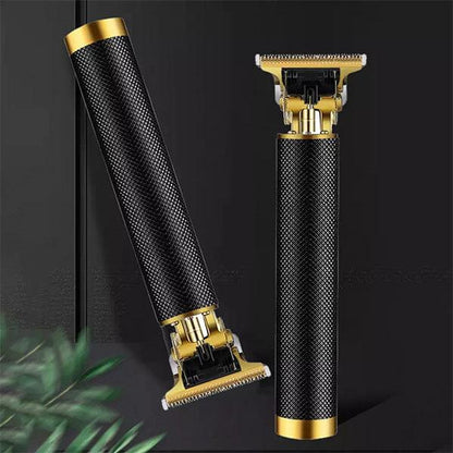 Two black and gold T9 hair trimmers on dark background in Pakistan